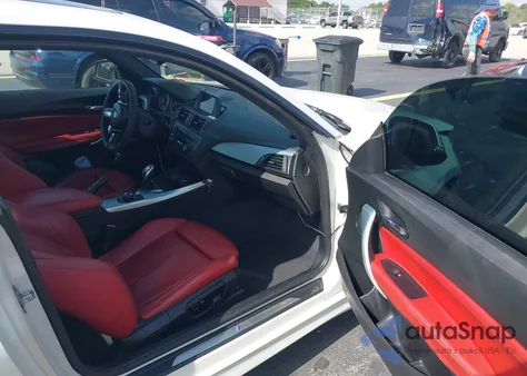 2014 BMW 228 z USA, uszkodzony, nr VIN WBA1F5C54EV246340